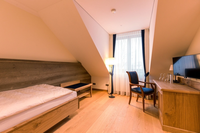 Imagen de la habitación del Hotel and Gastst&auml;tte Zum Erdinger Wei&szlig;br&auml;u. Foto 17