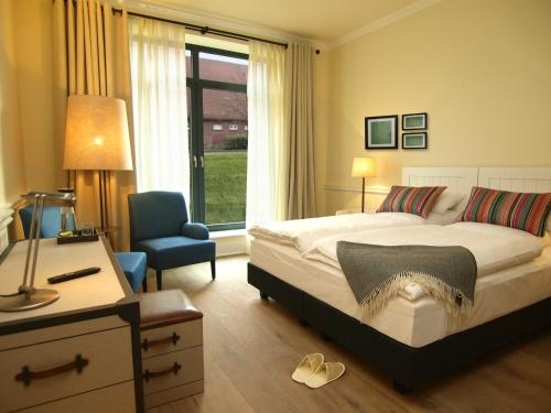 Imagen de la habitación del Hotel and Gästehaus Gut Kaden. Foto 10