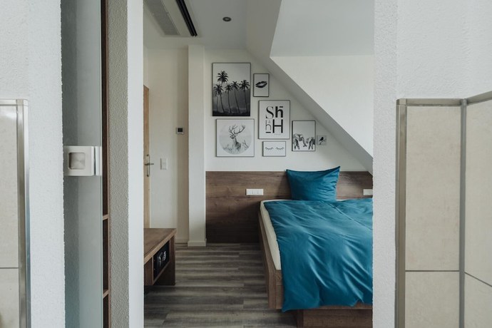 Imagen de la habitación del Hotel and Restaurant Hessischer Hof. Foto 9