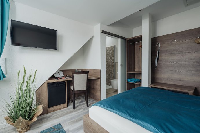 Imagen de la habitación del Hotel and Restaurant Hessischer Hof. Foto 15