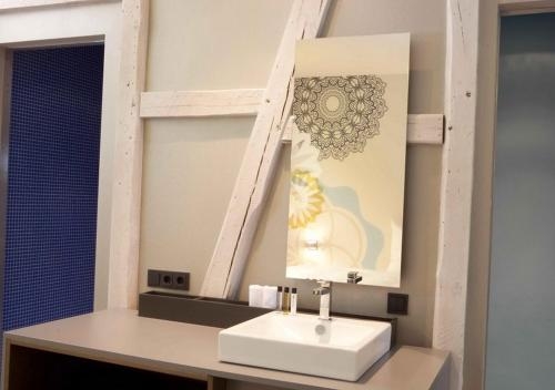 Imagen de la habitación del Hotel and Restaurant Heyligenstaedt. Foto 10