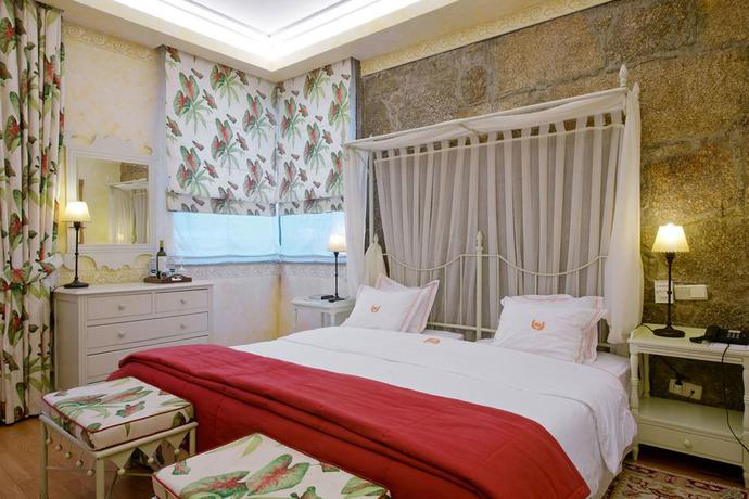 Imagen de la habitación del Hotel de Charme Quinta do Pinheiro. Foto 4