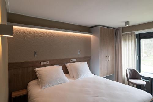 Imagen de la habitación del Hotel de Werelt. Foto 15