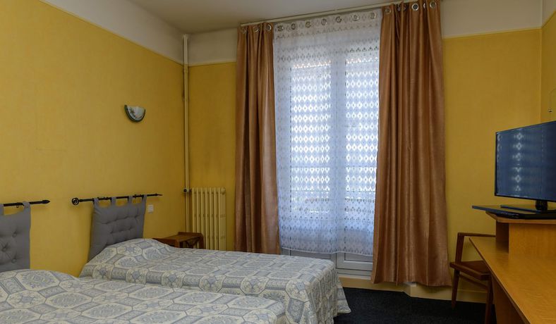 Imagen de la habitación del Hotel de la Cloche. Foto 16