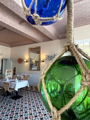 Imagen del bar/restaurante del Hotel de la Mer. Foto 1