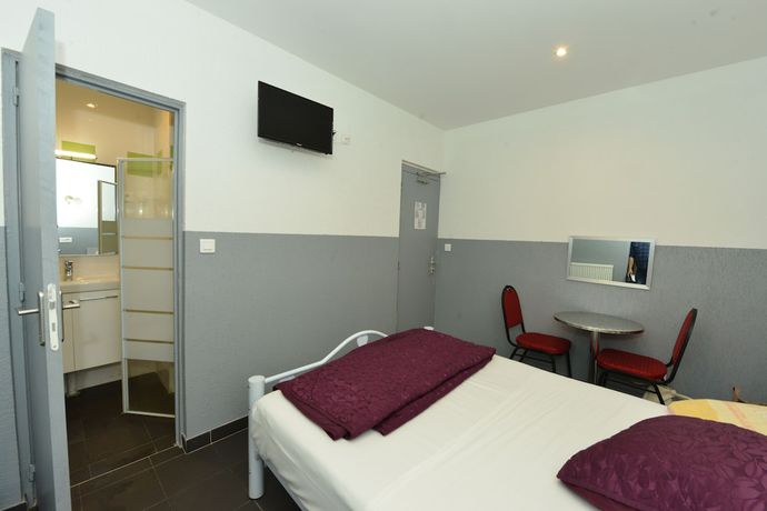 Imagen de la habitación del Hotel de la Poste. Foto 7