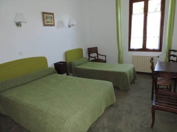 Imagen de la habitación del Hotel des Touristes. Foto 10