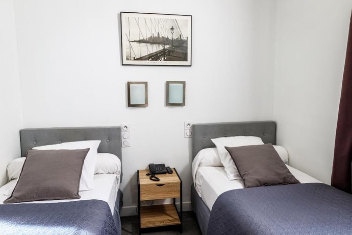Imagen de la habitación del Hotel du Dauphin&eacute;. Foto 7