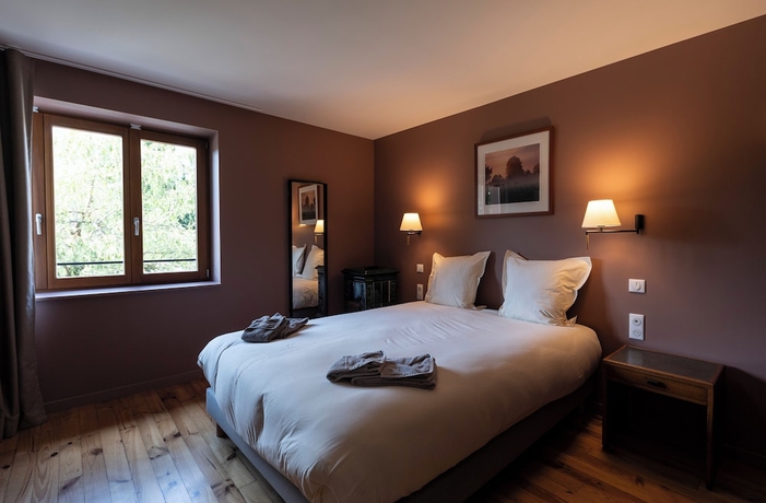 Imagen de la habitación del Hotel du Domaine Saint Loup. Foto 2