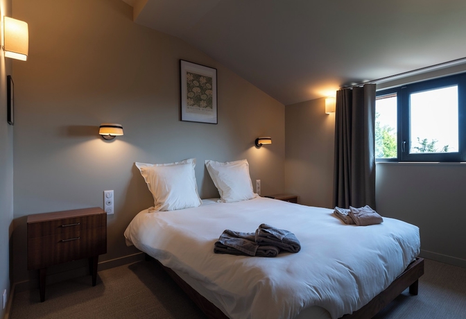 Imagen de la habitación del Hotel du Domaine Saint Loup. Foto 3