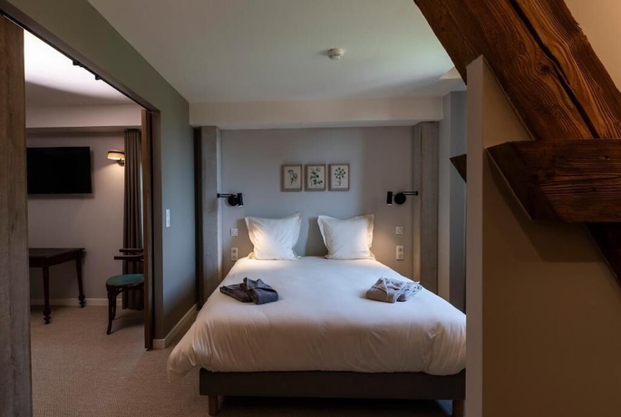 Imagen de la habitación del Hotel du Domaine Saint Loup. Foto 11