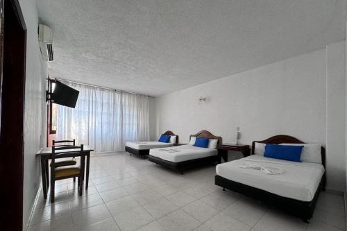 Imagen de la habitación del Hotel el Diamante Melgar. Foto 14