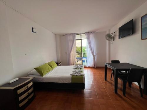 Imagen de la habitación del Hotel el Diamante Melgar. Foto 15