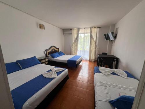 Imagen de la habitación del Hotel el Diamante Melgar. Foto 16