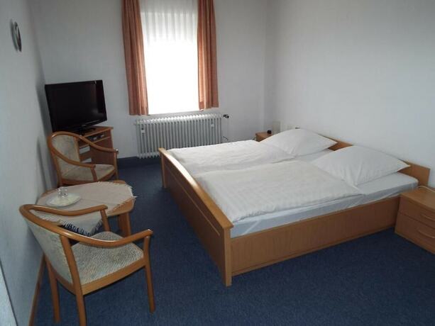 Imagen de la habitación del Hotel garni Zum Reinhartswald. Foto 17