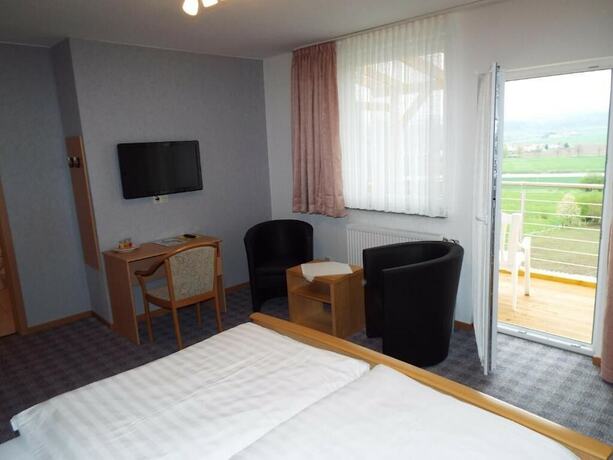 Imagen de la habitación del Hotel garni Zum Reinhartswald. Foto 20