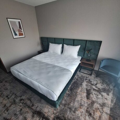 Imagen de la habitación del Hotel iNova. Foto 15