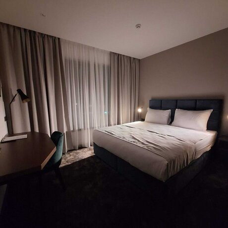 Imagen de la habitación del Hotel iNova. Foto 16