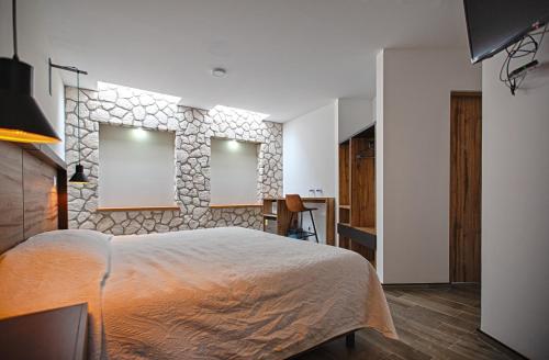 Imagen de la habitación del Hotel la Cuesta Toscana. Foto 16