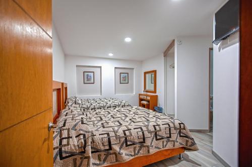 Imagen de la habitación del Hotel la Cuesta Toscana. Foto 17