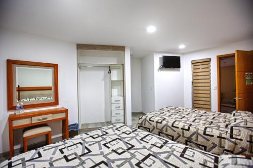 Imagen de la habitación del Hotel la Cuesta Toscana. Foto 18
