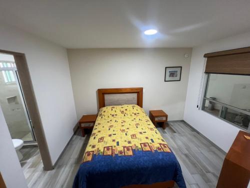 Imagen de la habitación del Hotel la Cuesta Toscana. Foto 20