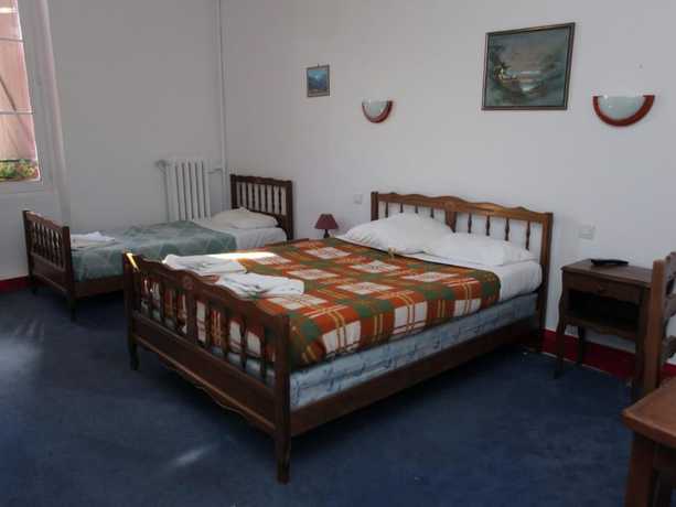 Imagen de la habitación del Hotel le Chapeau Rouge. Foto 11