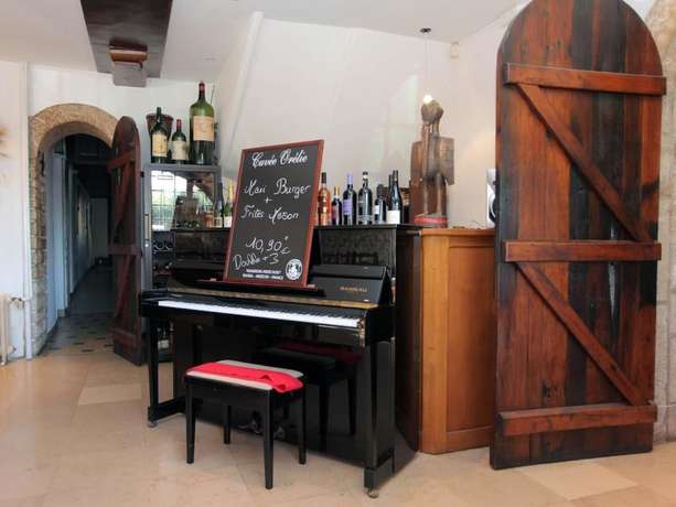 Imagen del bar/restaurante del Hotel le Chapeau Rouge. Foto 5