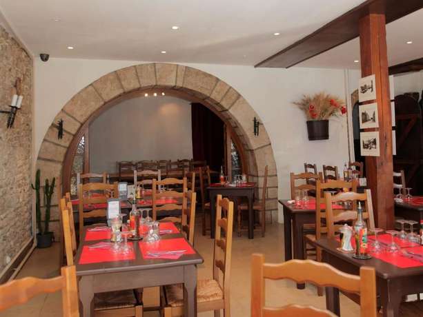 Imagen del bar/restaurante del Hotel le Chapeau Rouge. Foto 6