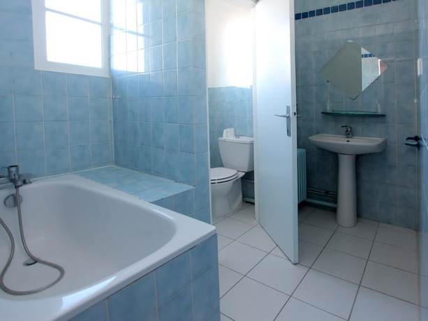Imagen de la habitación del Hotel le Chapeau Rouge. Foto 14