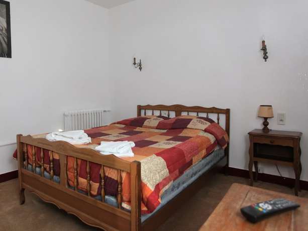 Imagen de la habitación del Hotel le Chapeau Rouge. Foto 16