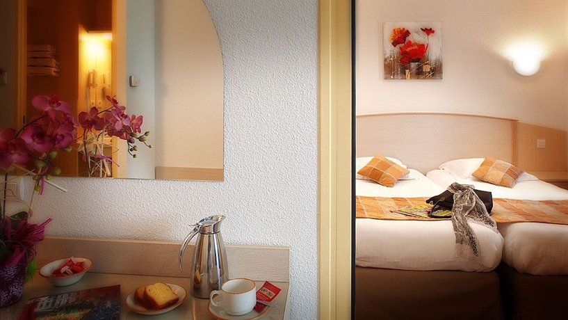 Imagen de la habitación del Hotel le kolibri. Foto 9