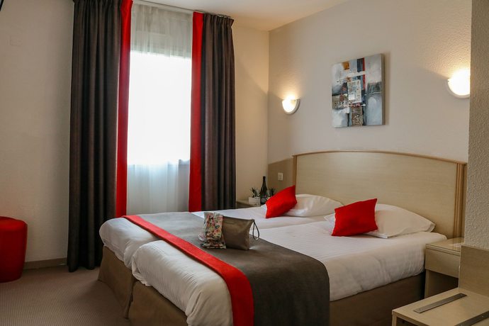 Imagen de la habitación del Hotel le kolibri. Foto 15