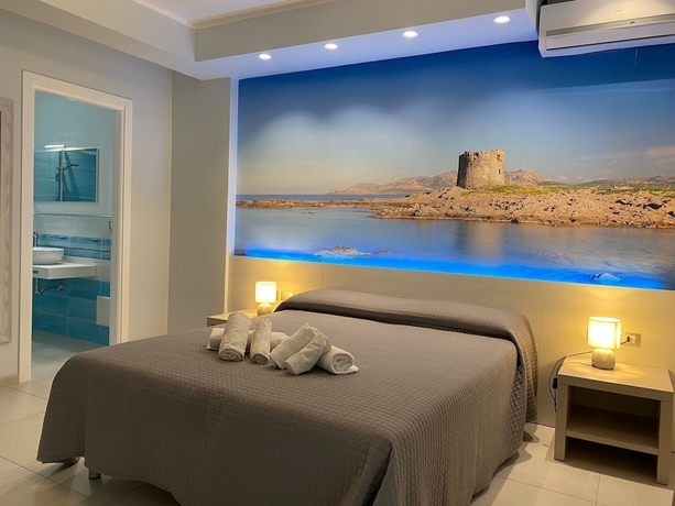 Imagen de la habitación del Hotel on the promenade of Stintino. Foto 3