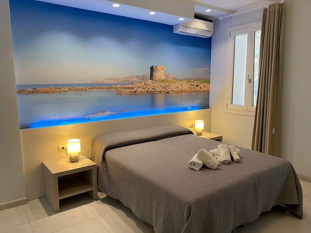 Imagen de la habitación del Hotel on the promenade of Stintino. Foto 4