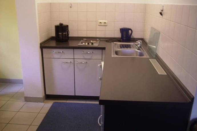 Imagen de la habitación del Hotel und Appartmenthaus Rheden. Foto 8