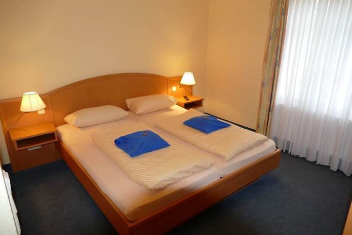 Imagen de la habitación del Hotel vom Land zum Meer. Foto 13