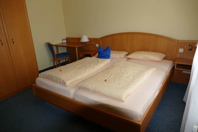 Imagen de la habitación del Hotel vom Land zum Meer. Foto 14