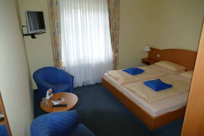Imagen de la habitación del Hotel vom Land zum Meer. Foto 16