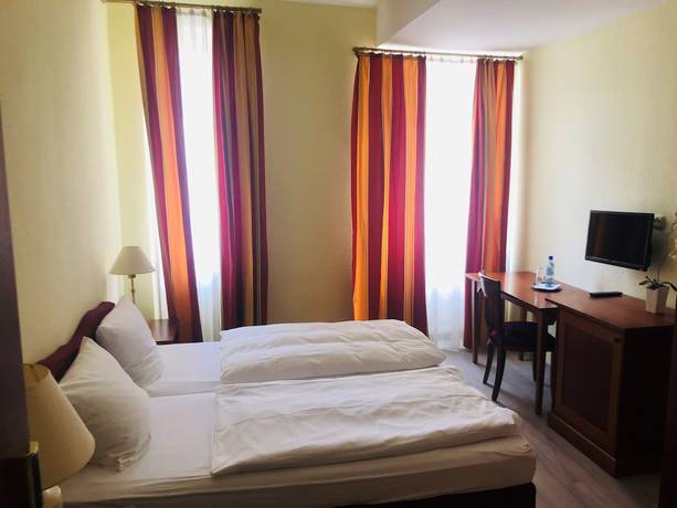 Imagen de la habitación del Hotel-Events Adlerpalast. Foto 15