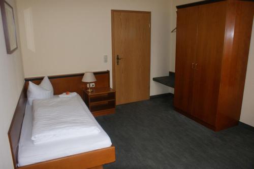 Imagen de la habitación del Hotel-Gasthof Postbr&auml;u Dingolfing. Foto 5