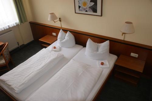 Imagen de la habitación del Hotel-Gasthof Postbr&auml;u Dingolfing. Foto 6