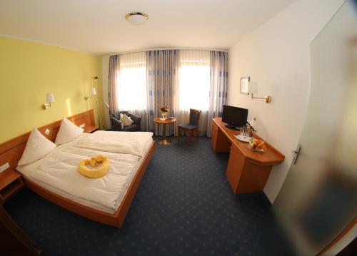 Imagen de la habitación del Hotel-Landgasthof Schuster. Foto 7