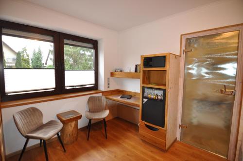 Imagen de la habitación del Hotel-Pension Blumenbach. Foto 19