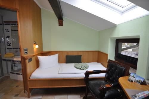 Imagen de la habitación del Hotel-Pension Blumenbach. Foto 28