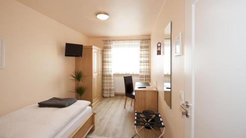 Imagen de la habitación del Hotel-Pension Hommen. Foto 5