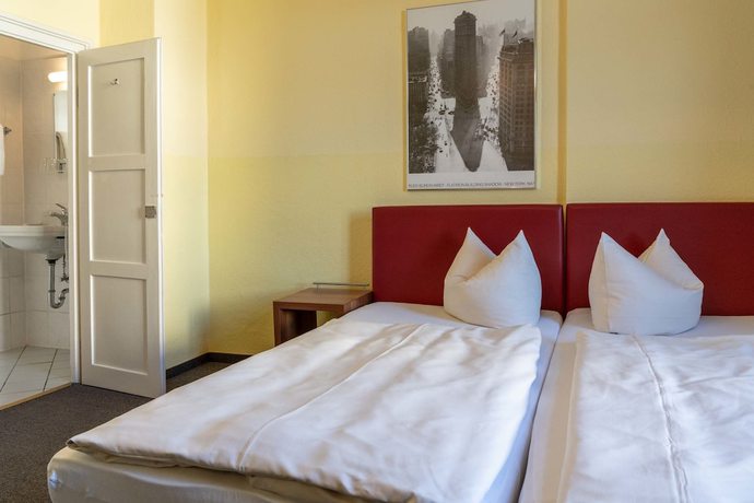 Imagen de la habitación del Hotel-Pension am Siegestor. Foto 10