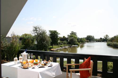 Imagen de la habitación del Hoteldorf Seepark Weiden. Foto 11