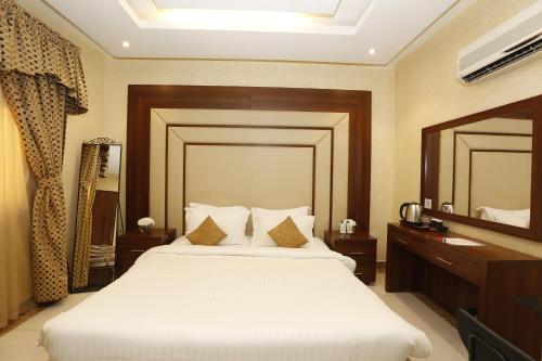 Imagen de la habitación del Hotelier Suites by Cantonal. Foto 17