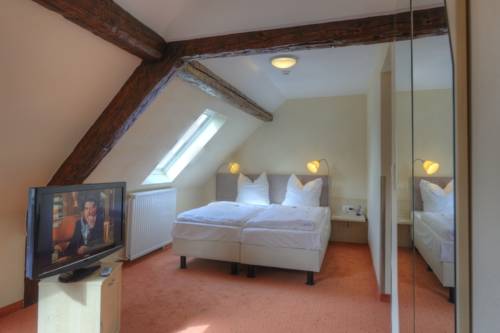Imagen de la habitación del Hotel-pension Altes Weinhaus. Foto 6